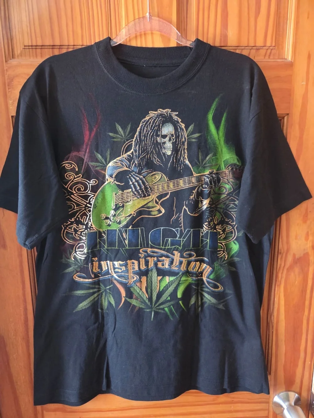 Black Graphic T-Shirt with Green Guitar Skull Design